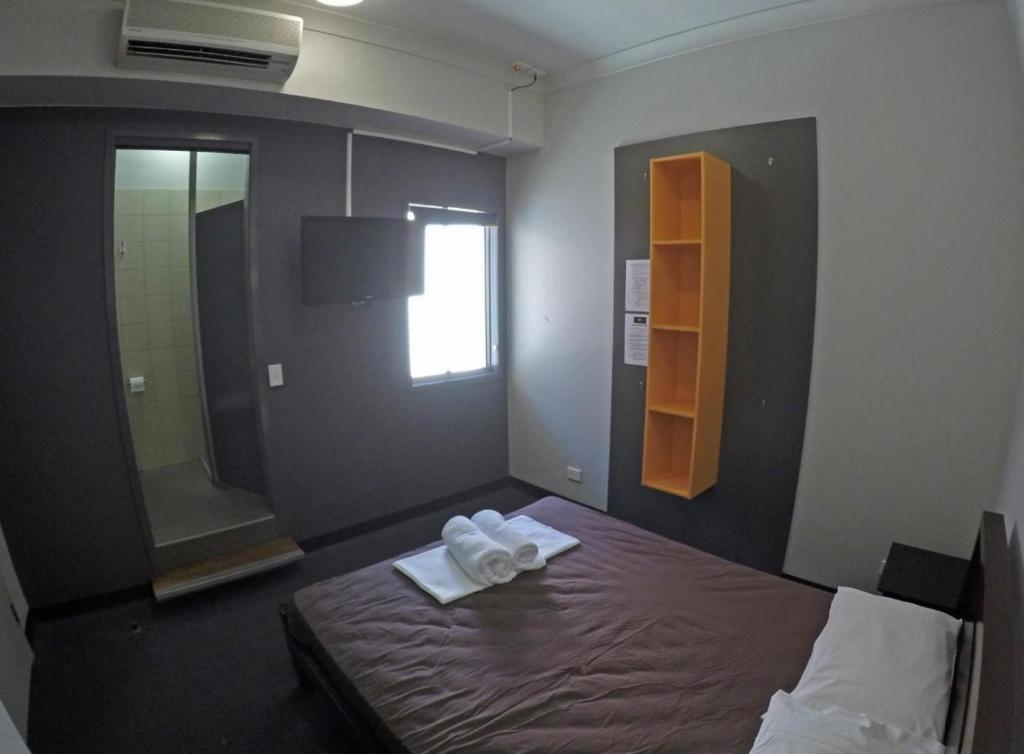 Postel nebo postele na pokoji v ubytování Global Backpackers Port Douglas