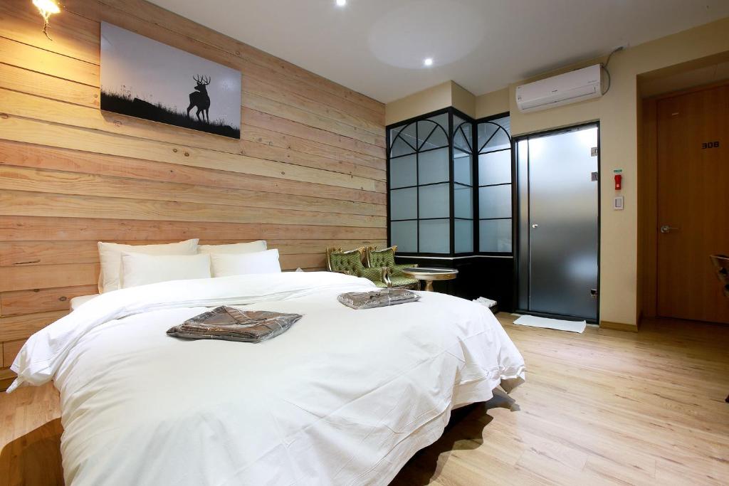 Postel nebo postele na pokoji v ubytování W Hotel