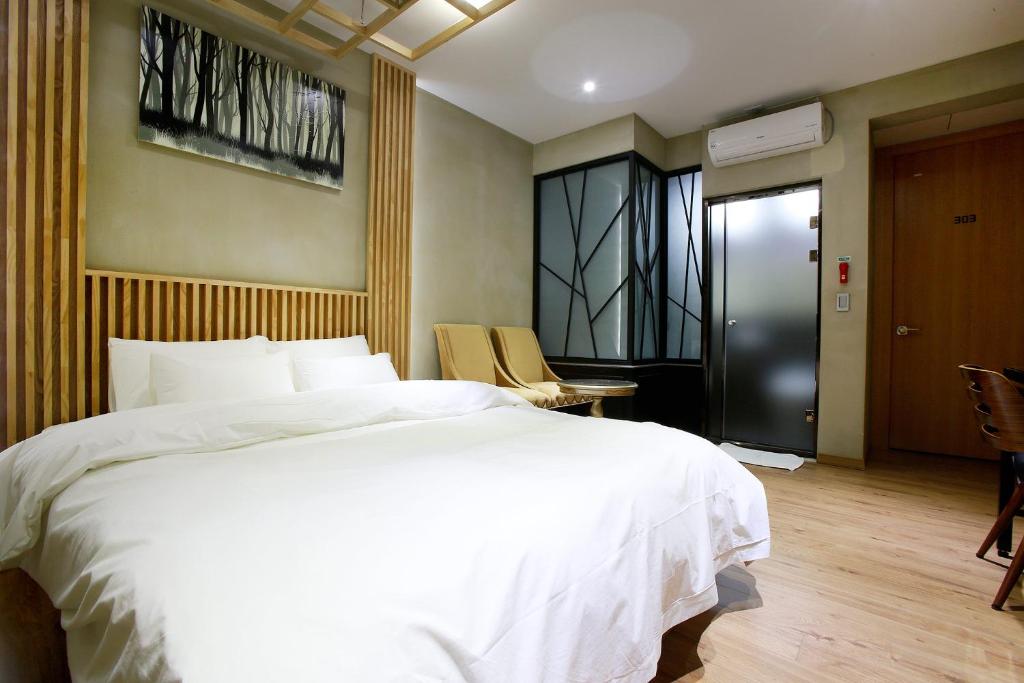 Postel nebo postele na pokoji v ubytování W Hotel