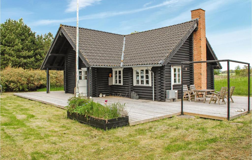 Κήπος έξω από το Holiday Home Knebel With Sauna I