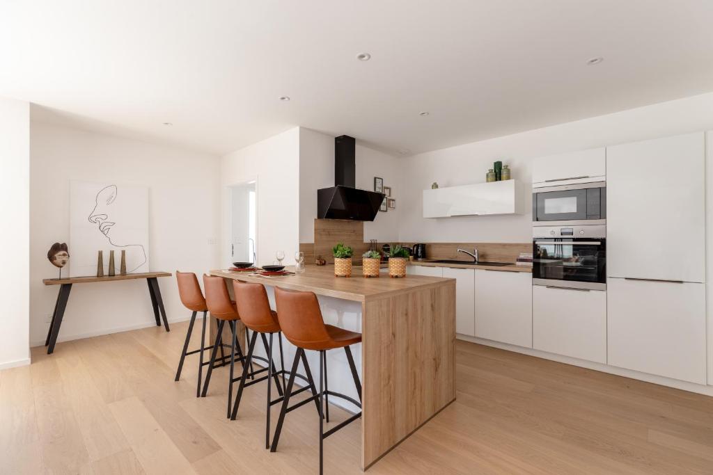 Kuchyň nebo kuchyňský kout v ubytování Appartements du comte de Dabo