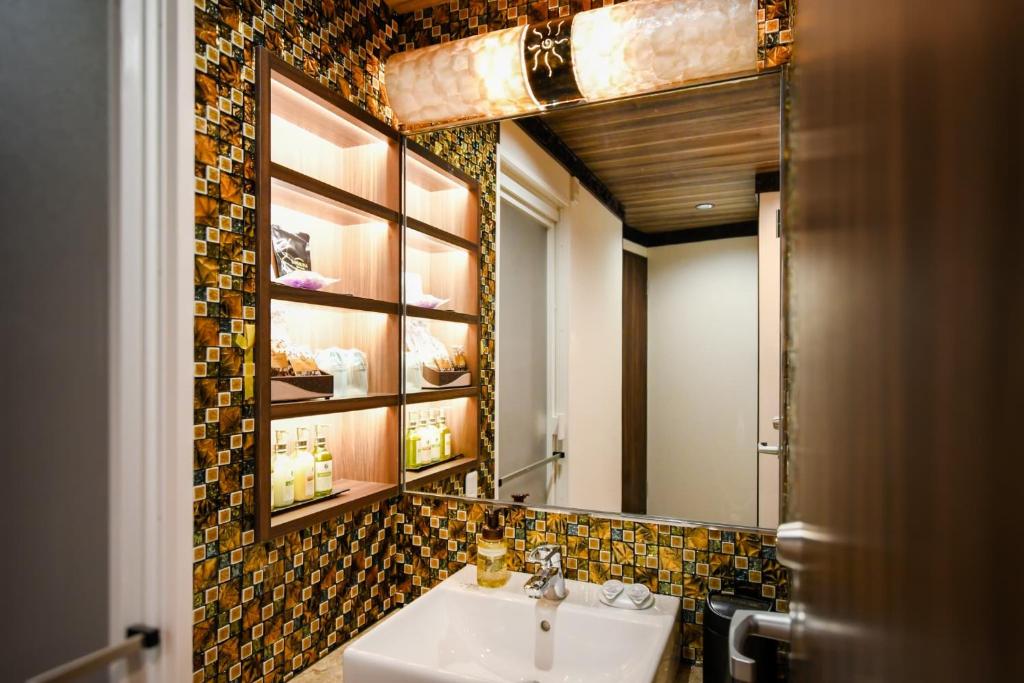 Koupelna v ubytování Hotel BaliBali ANNEX 五反田