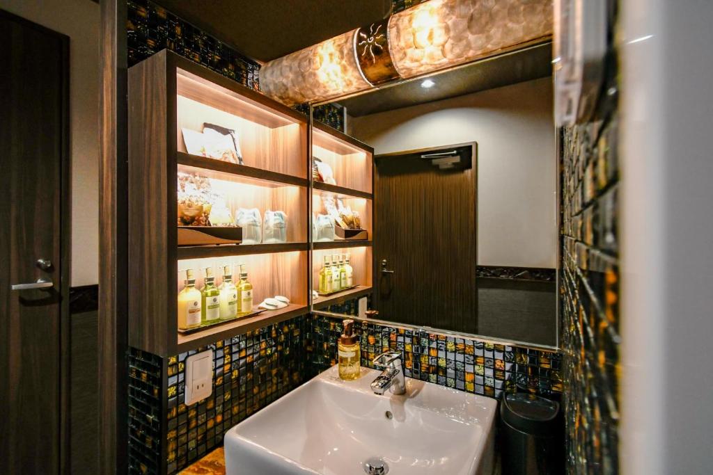 Koupelna v ubytování Hotel BaliBali ANNEX 五反田