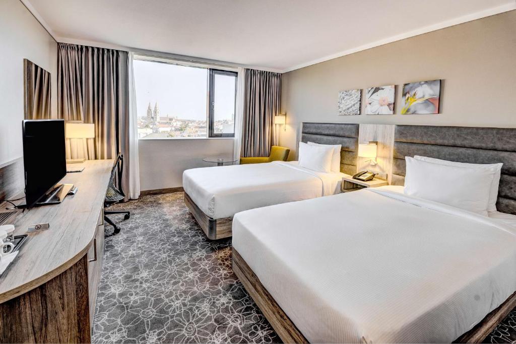 Posteľ alebo postele v izbe v ubytovaní Hilton Garden Inn Wiener Neustadt