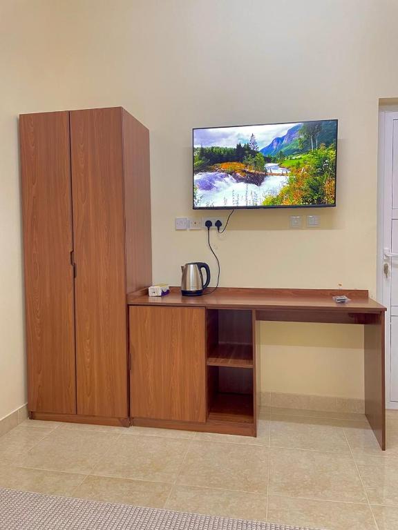 TV a/nebo společenská místnost v ubytování Sunset hotel