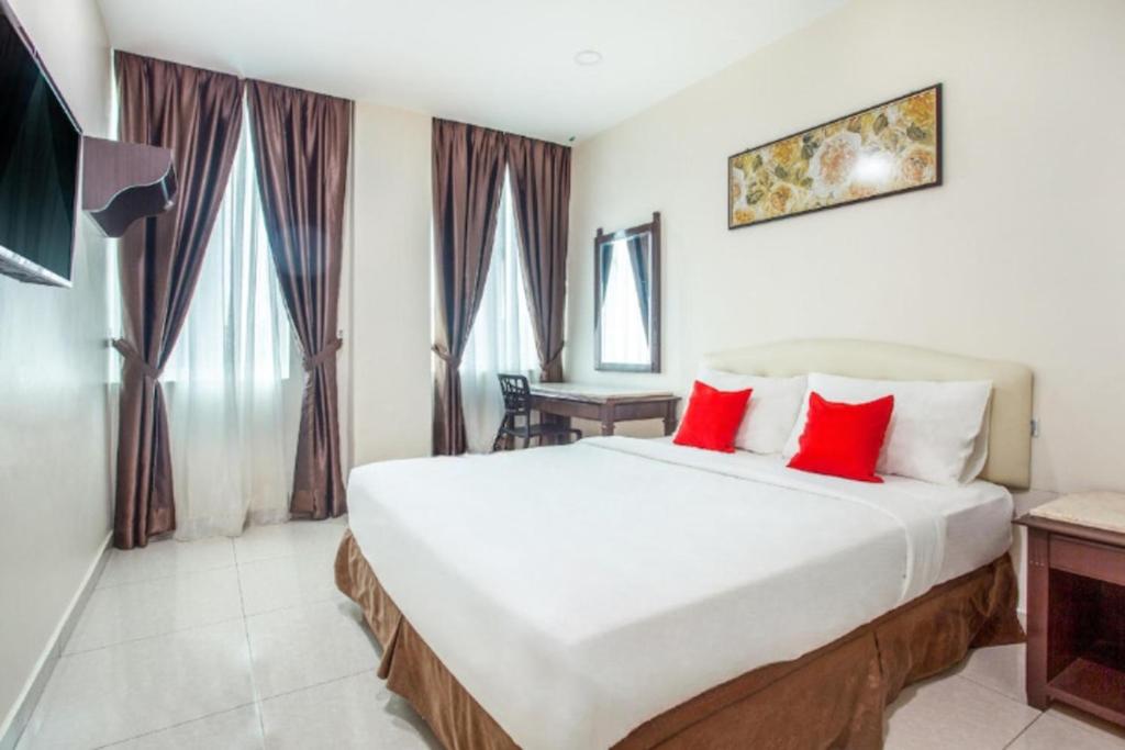 Postel nebo postele na pokoji v ubytování Sam Hotel