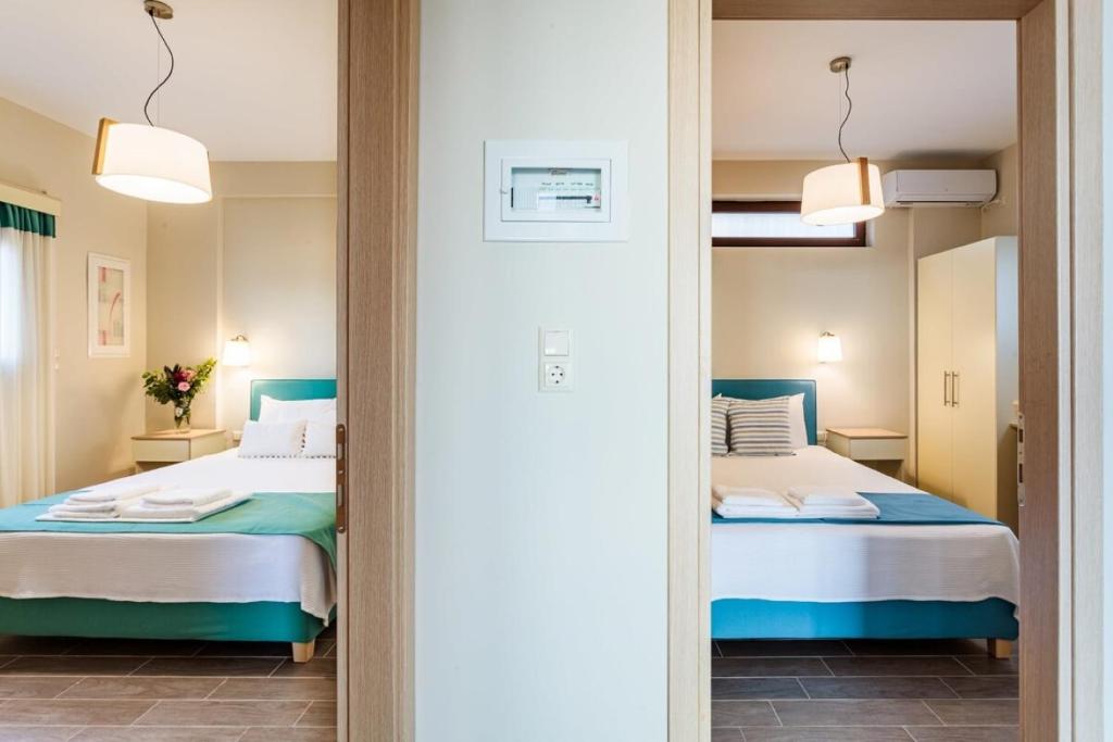 Posteľ alebo postele v izbe v ubytovaní Seaside Summer Bliss - Aurora Luxury Pool Paradise
