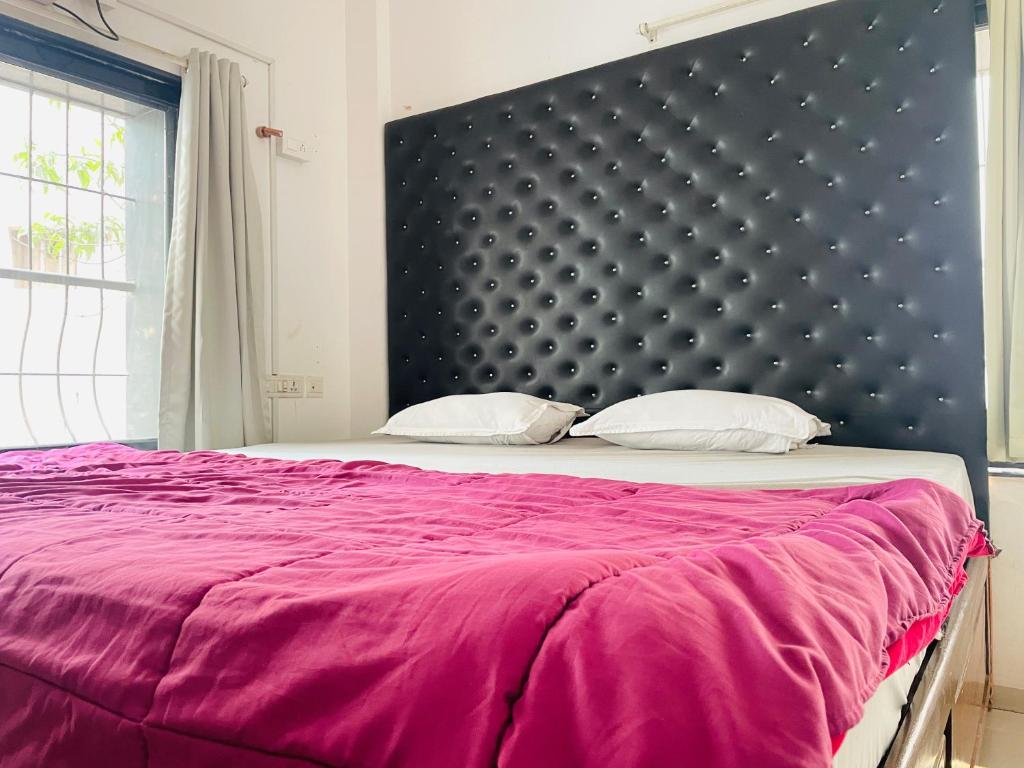 Postel nebo postele na pokoji v ubytování Lifespace- Spacious Hostel in a Luxurious Villa
