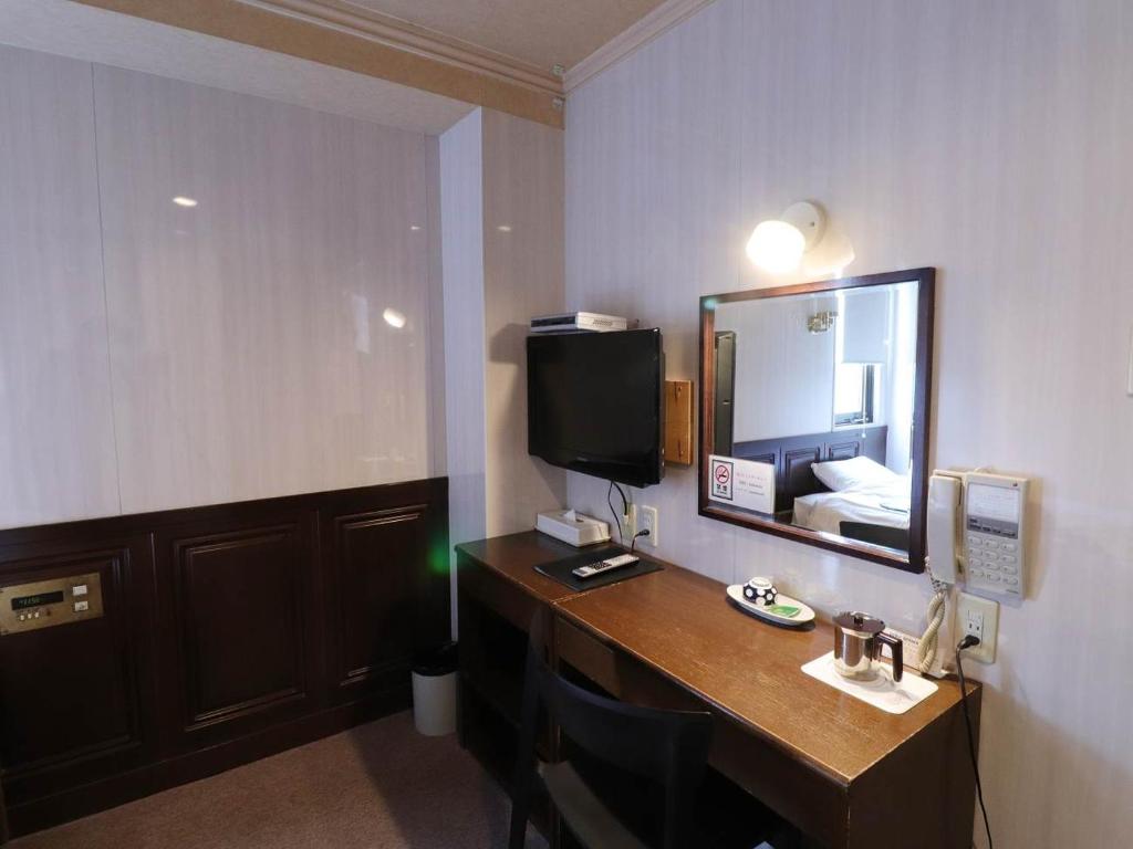 TV a/nebo společenská místnost v ubytování Hotel Wakamizu