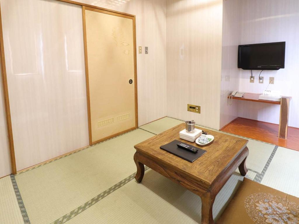 TV a/nebo společenská místnost v ubytování Hotel Wakamizu