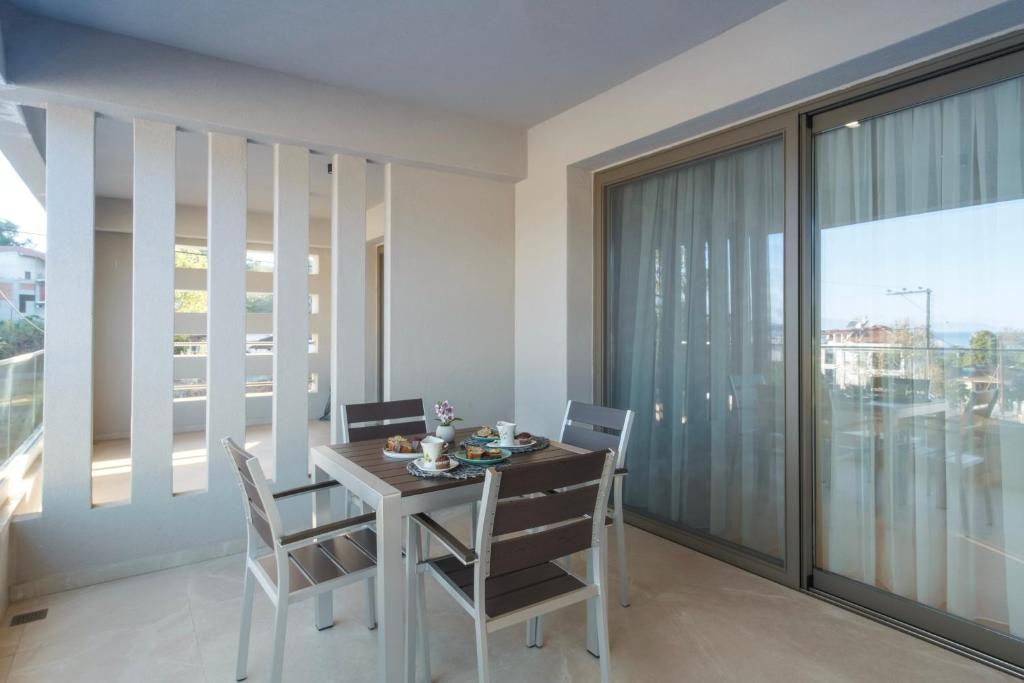 Fotografie z fotogalerie ubytování Aura Luxury Suites - Olympiada Seaside Getaways v destinaci Olympiada