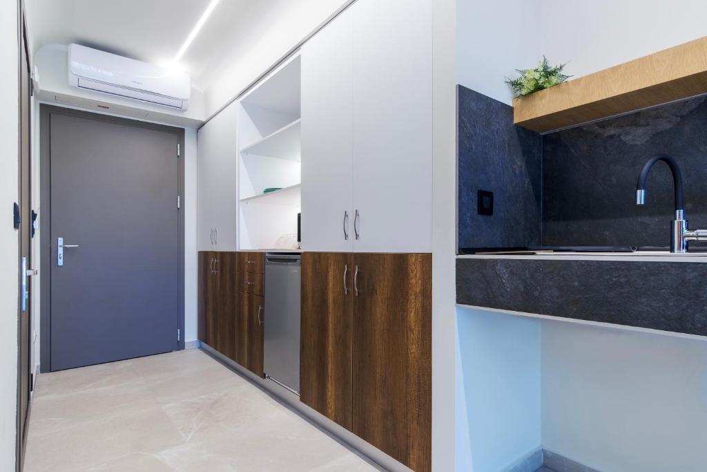 Kuchyň nebo kuchyňský kout v ubytování Aura Luxury Suites - Olympiada Seaside Getaways