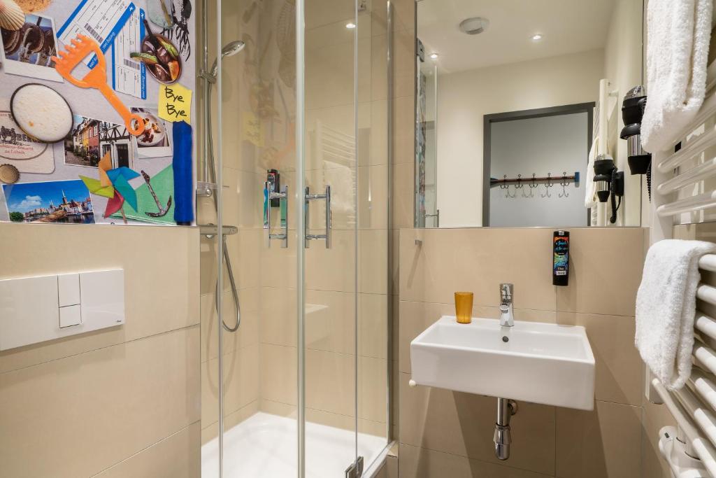 Koupelna v ubytování Hotel Hansestadt Lübeck
