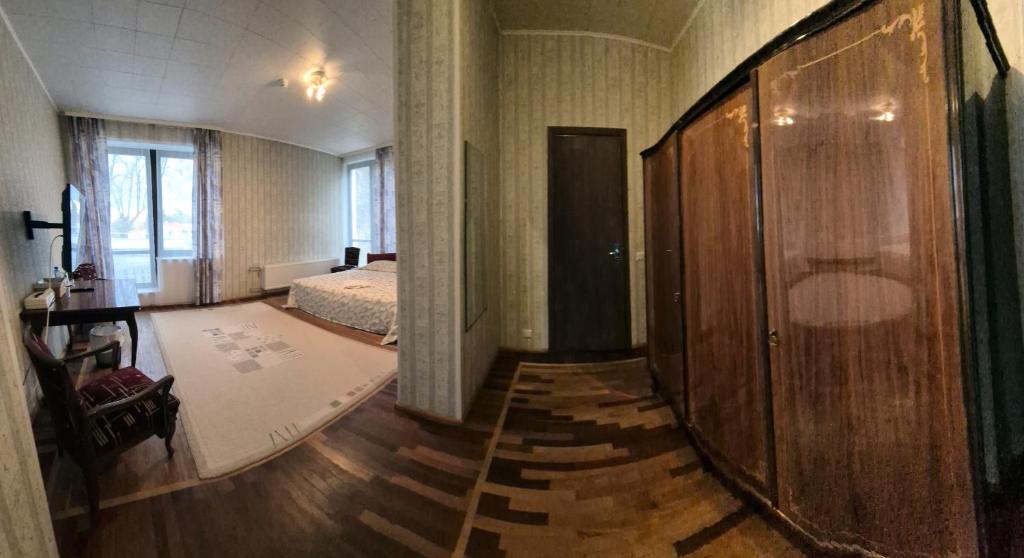 Postel nebo postele na pokoji v ubytování Narva-Jõesuu Beach Residence