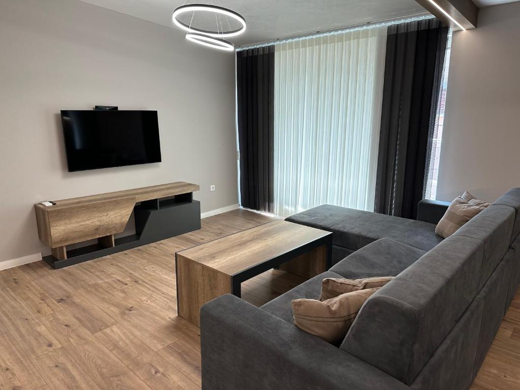 TV a/nebo společenská místnost v ubytování Vimar Apartments