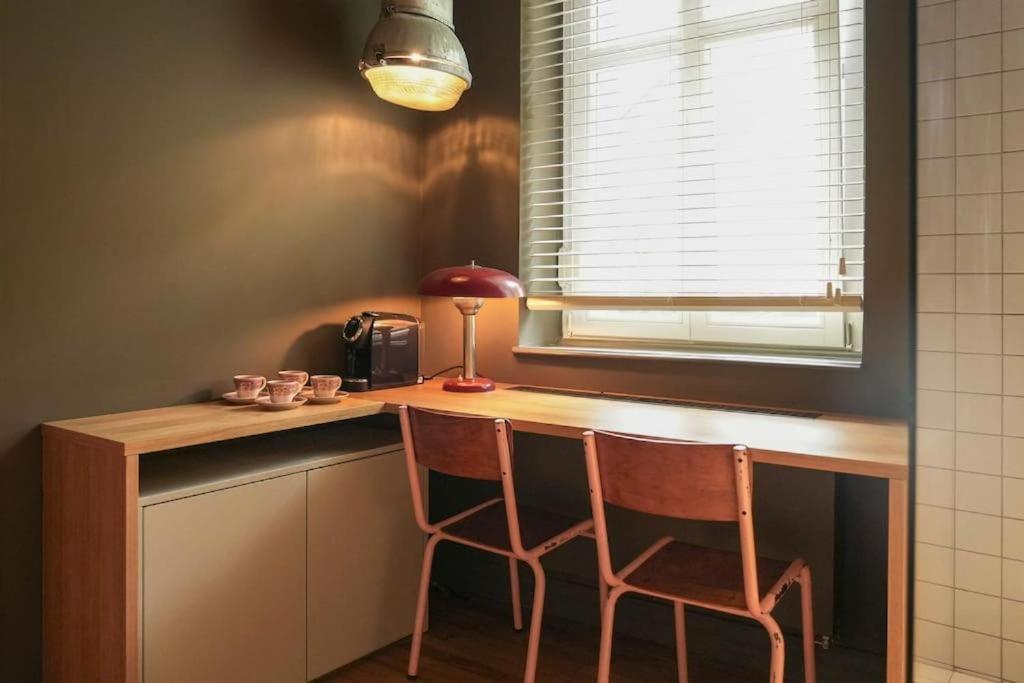 Kuchyň nebo kuchyňský kout v ubytování GRAACE House Suites
