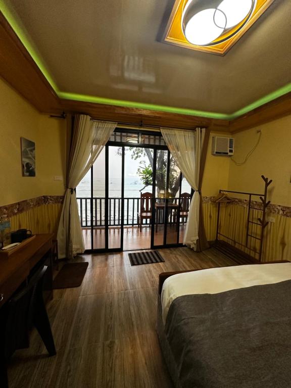 Postel nebo postele na pokoji v ubytování Fabregas Beach Cottages