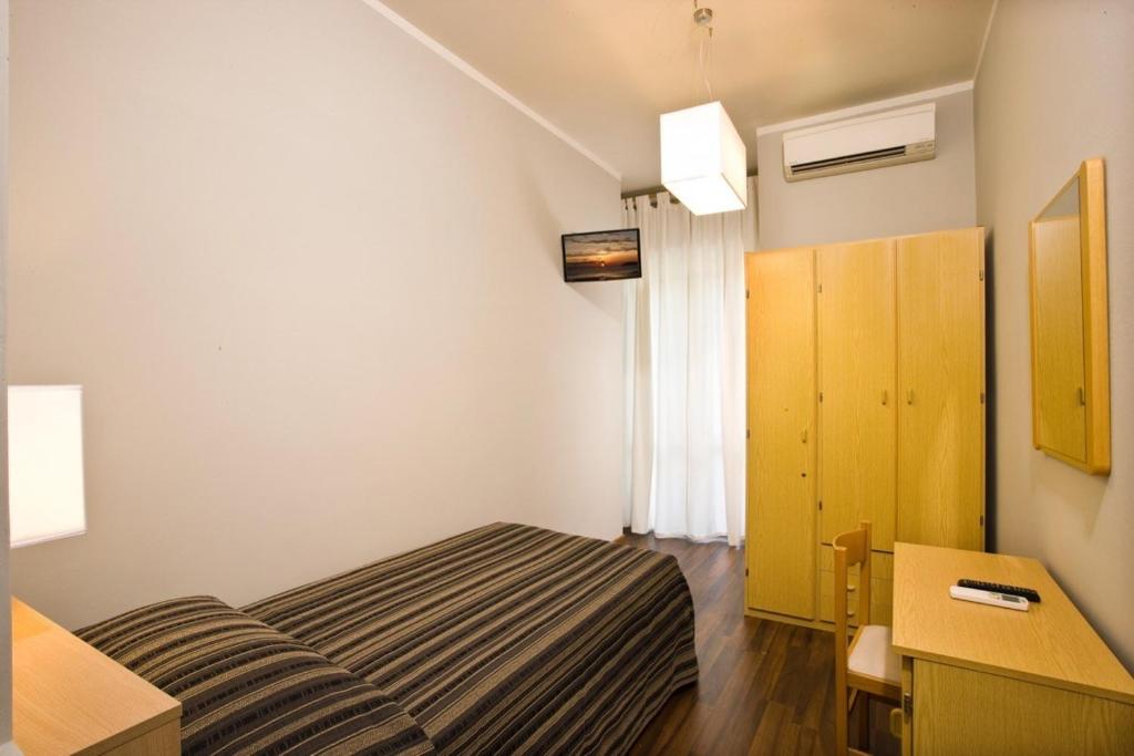 Postel nebo postele na pokoji v ubytování Duparc Hotel