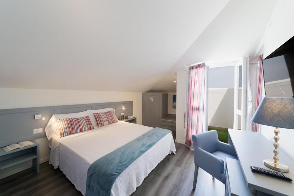 Postel nebo postele na pokoji v ubytování Duparc Hotel