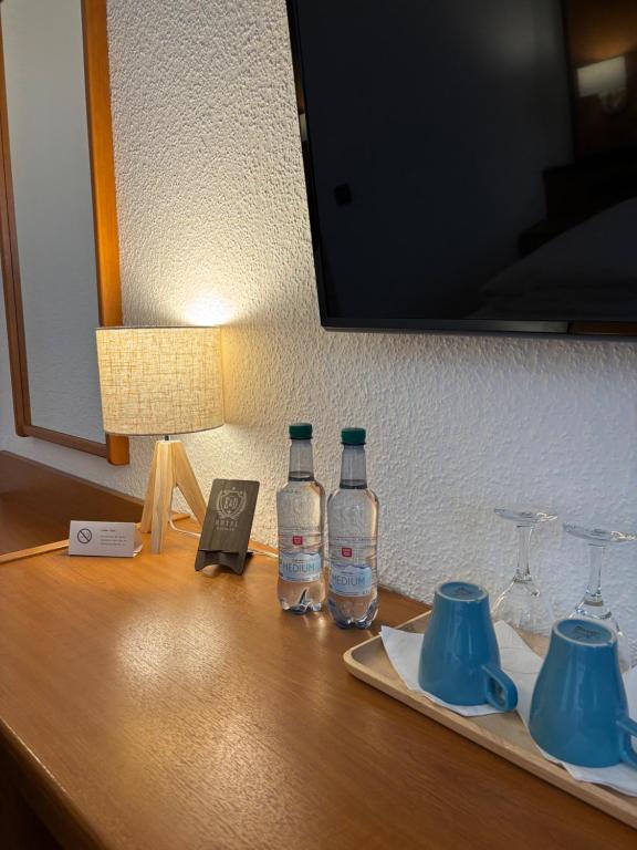 TV a/nebo společenská místnost v ubytování E&D Hotel Rodgau