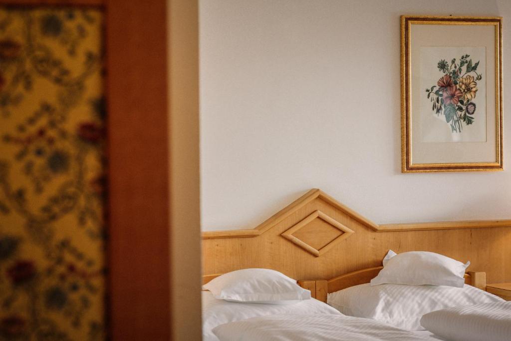 Postel nebo postele na pokoji v ubytování Hotel Bacherhof