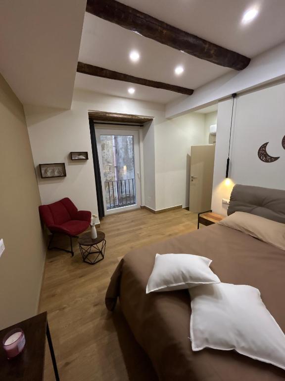 Postel nebo postele na pokoji v ubytování Somnia Luxury Rooms