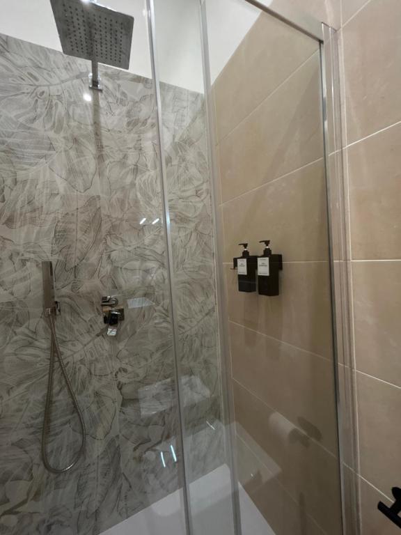 Koupelna v ubytování Somnia Luxury Rooms
