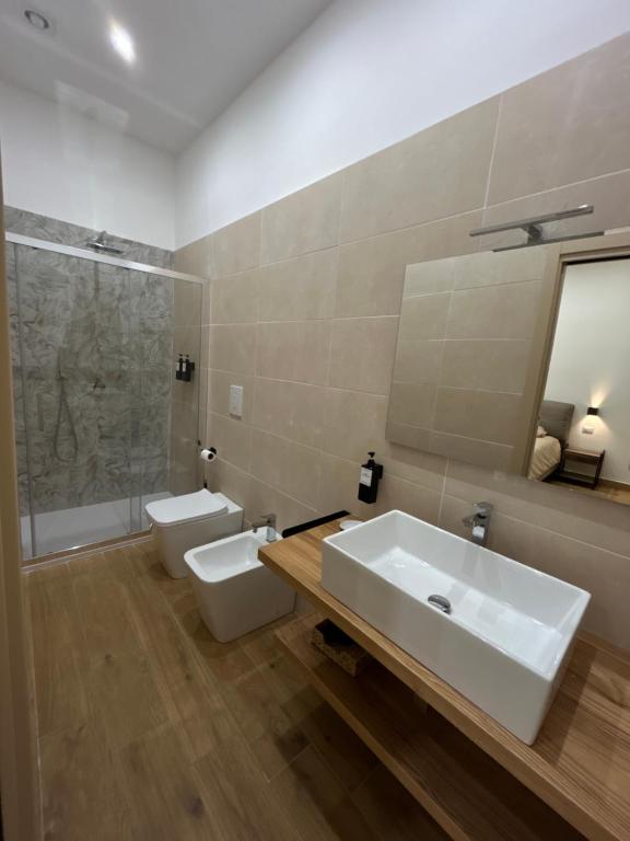 Koupelna v ubytování Somnia Luxury Rooms