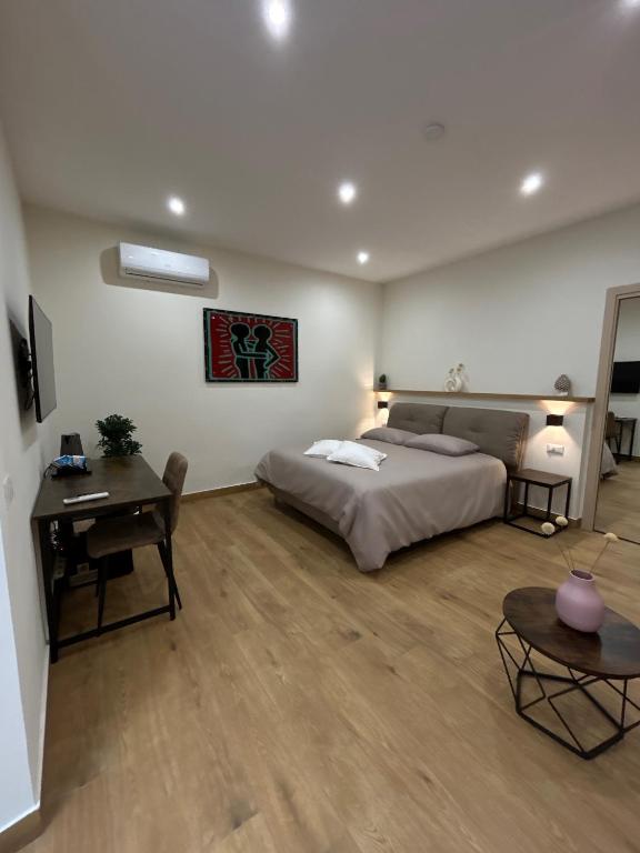 Postel nebo postele na pokoji v ubytování Somnia Luxury Rooms