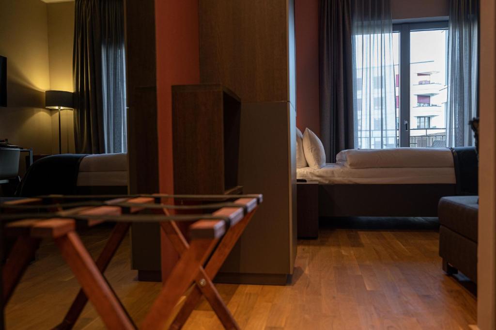 Posezení v ubytování Qube Hotel Bahnstadt