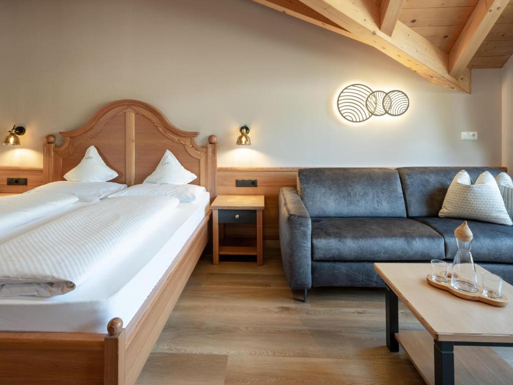 Postel nebo postele na pokoji v ubytování Hotel Bacherhof