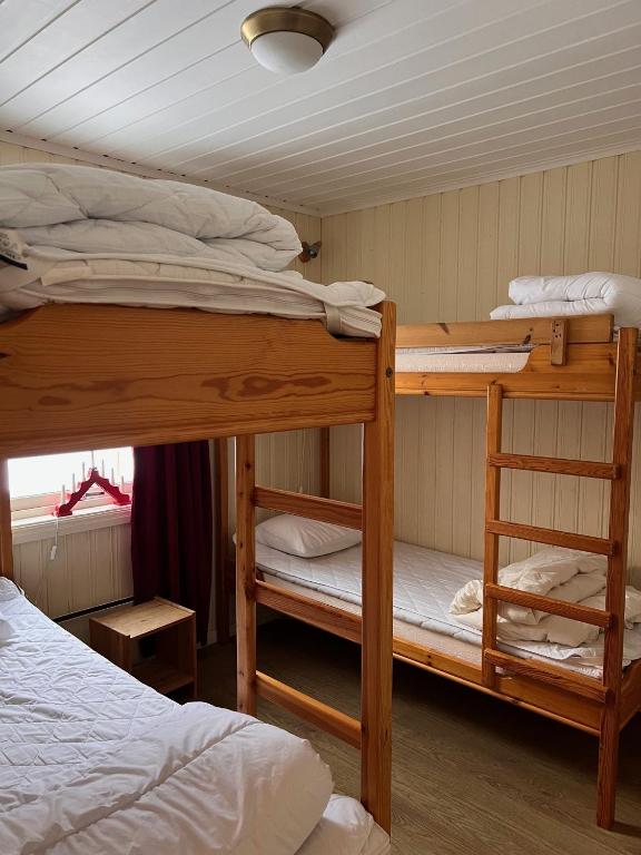 Кровать или кровати в номере Brostigen 5, Vemdalsskalet