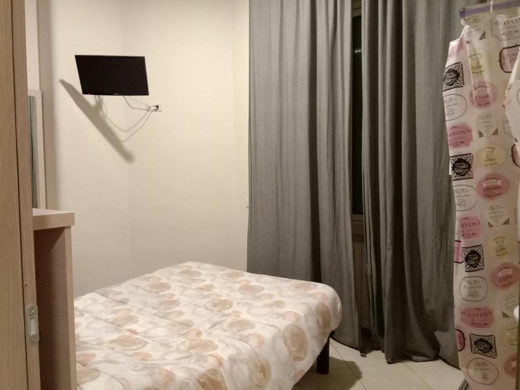 Postel nebo postele na pokoji v ubytování Hotel Midtown Milano