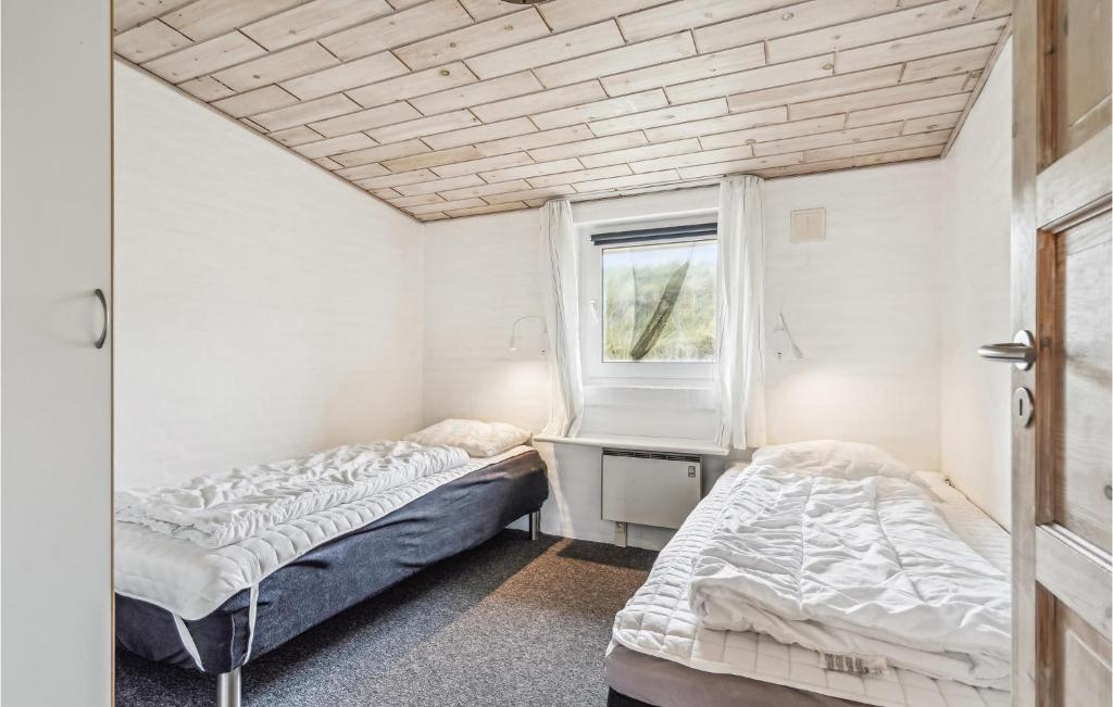 Postel nebo postele na pokoji v ubytování Holiday Home Søholmvej Hvide Sande Denm