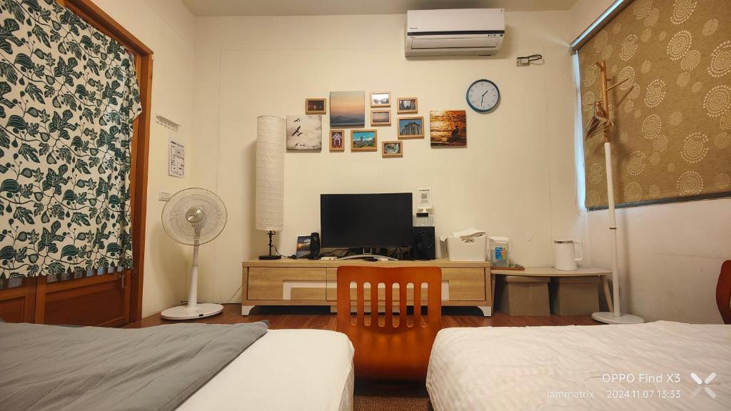 Postel nebo postele na pokoji v ubytování Homestyle Homestay