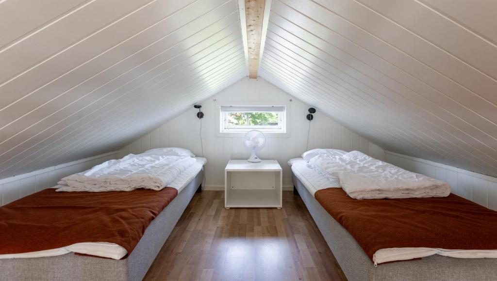 Postel nebo postele na pokoji v ubytování Evedals Camping Växjö