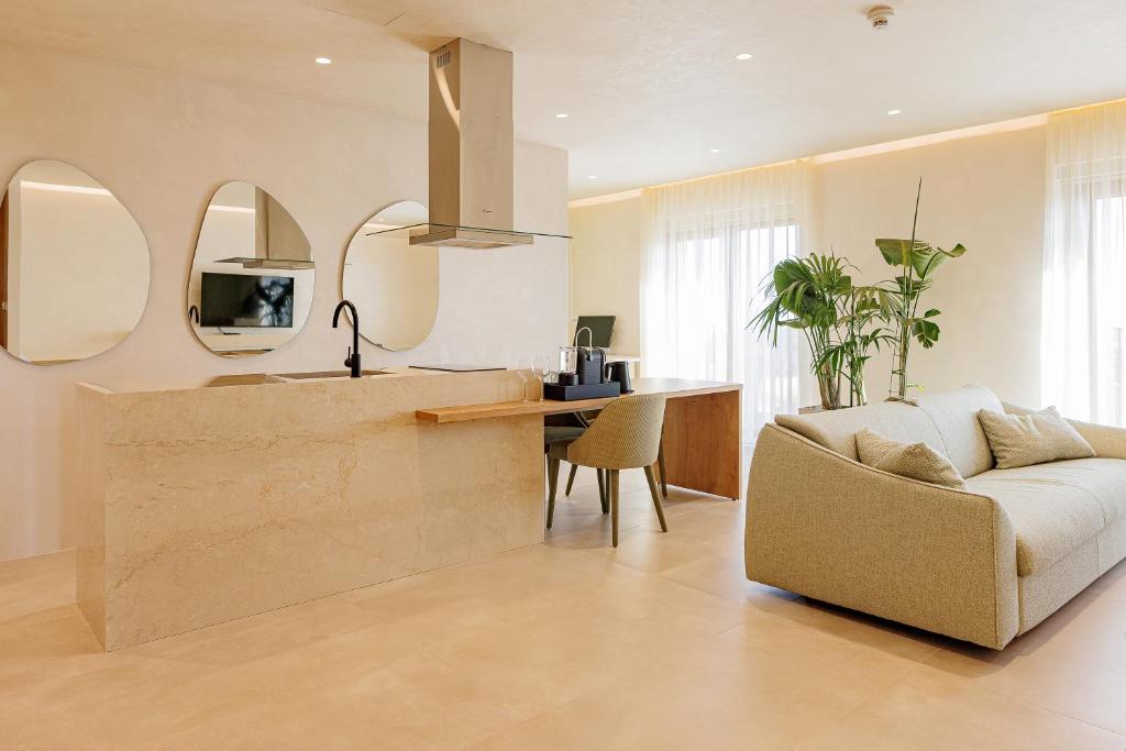 Kuchyň nebo kuchyňský kout v ubytování Hotel HOGO