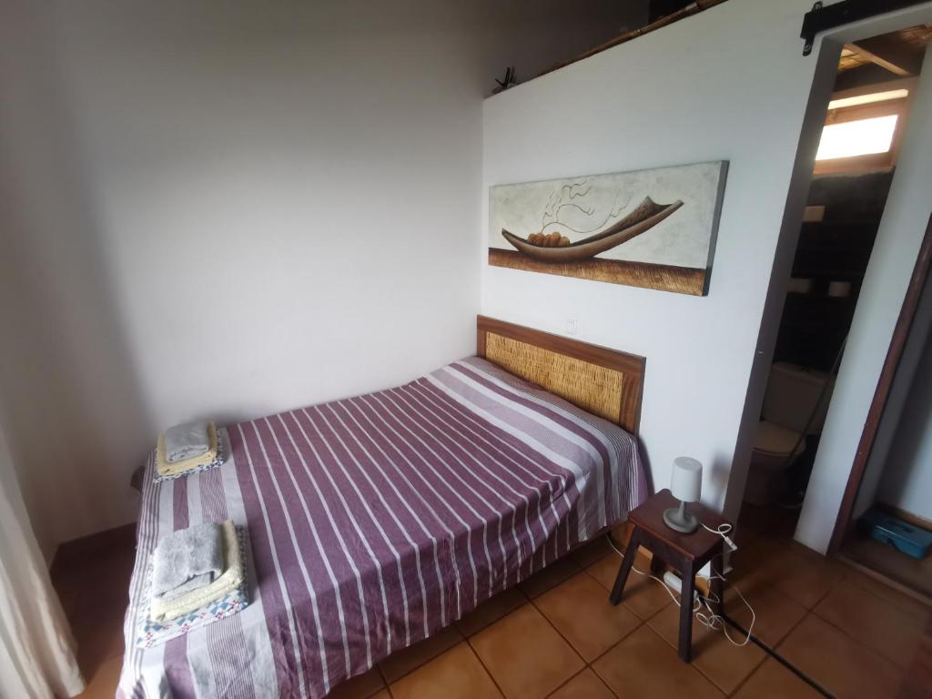 Postel nebo postele na pokoji v ubytování Casa Praia Tarrafal de Monte Trigo
