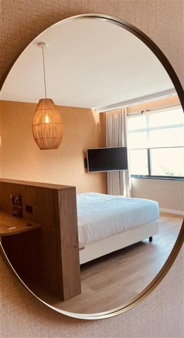 Postel nebo postele na pokoji v ubytování Van der Valk Hotel Houten Utrecht