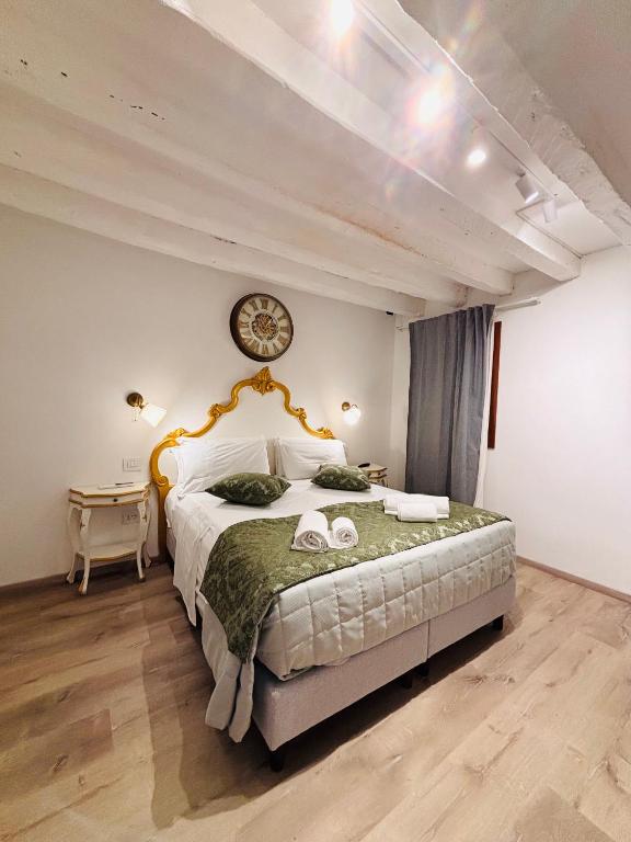 Postel nebo postele na pokoji v ubytování Al Canal Regio - Guest House