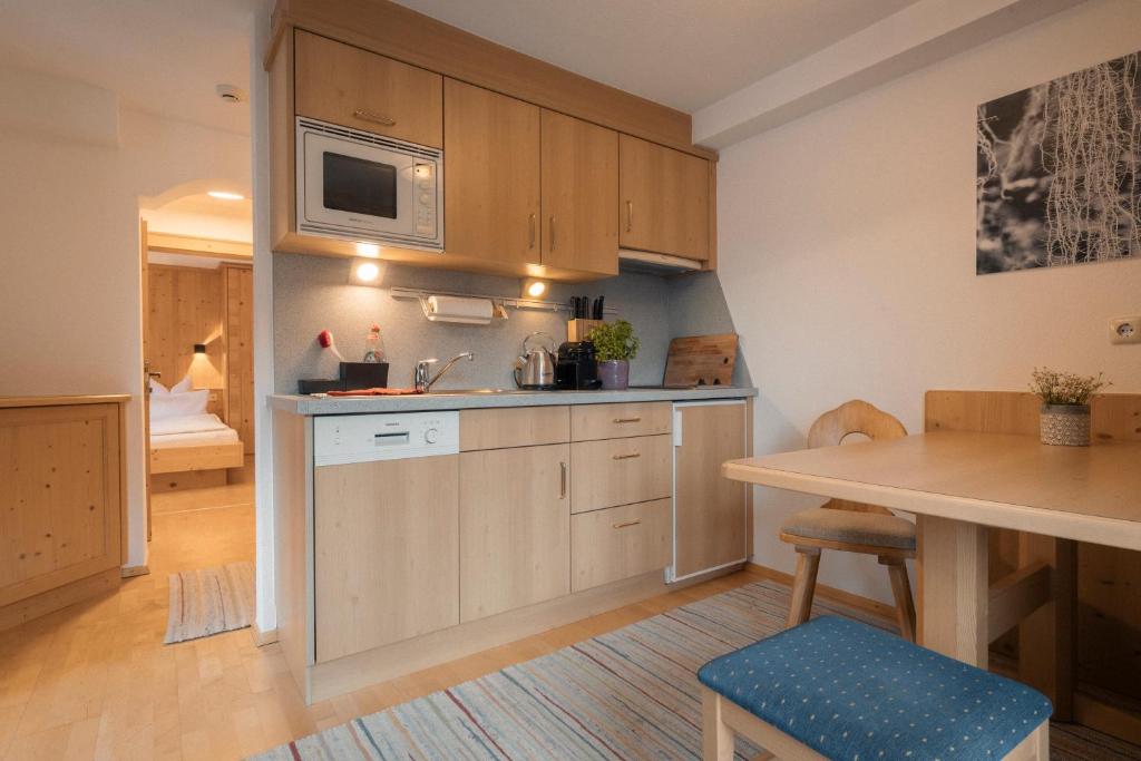 Kuchyňa alebo kuchynka v ubytovaní Apartments SARLO
