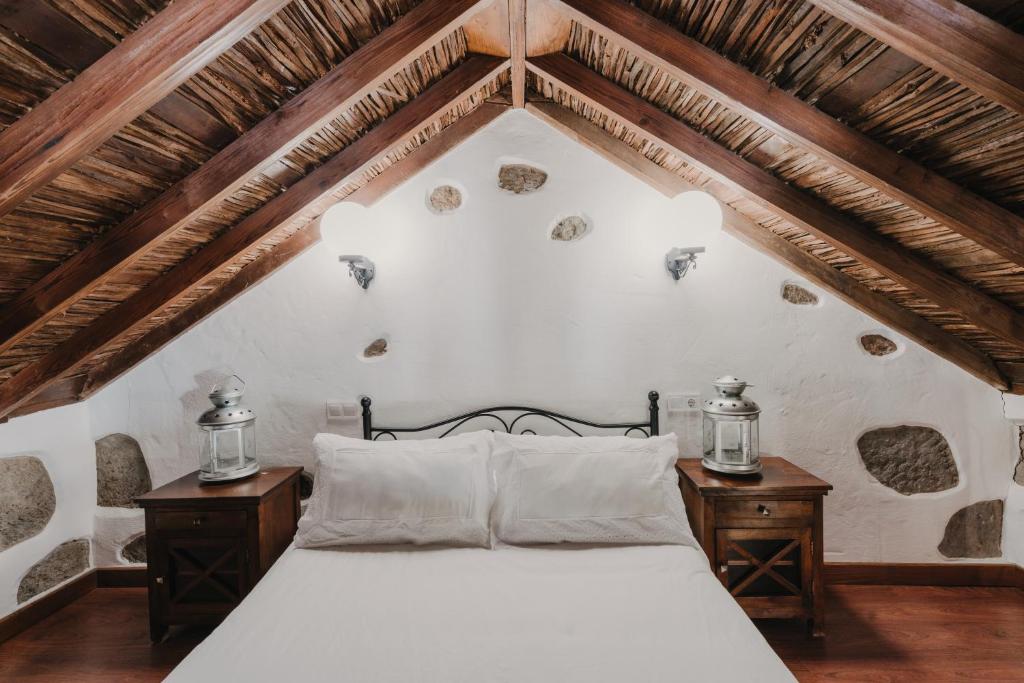 Posteľ alebo postele v izbe v ubytovaní Rural Suite Santiago de Tunte