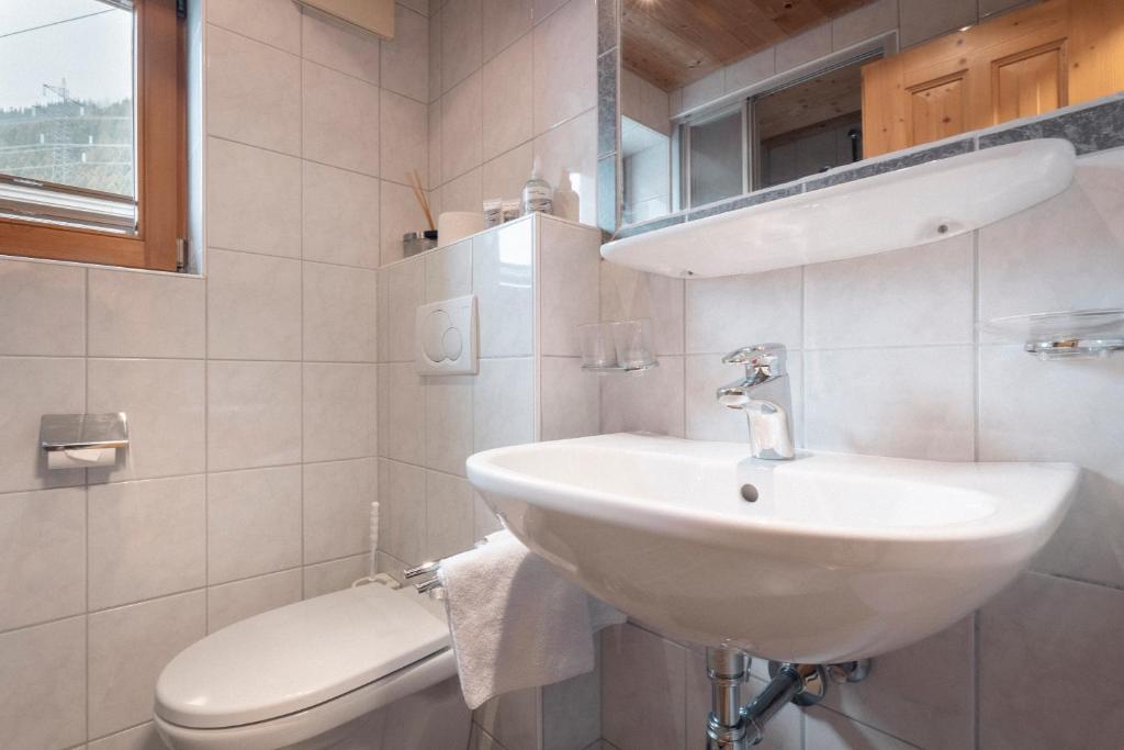Kúpeľňa v ubytovaní Apartments SARLO