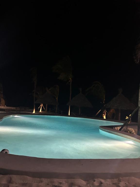 Der Swimmingpool an oder in der Nähe von Zanzi Soul Luxury Boutique Hotel