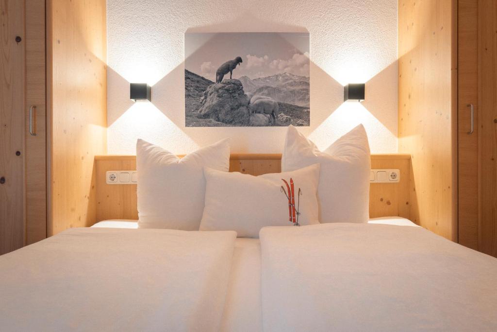 Posteľ alebo postele v izbe v ubytovaní Apartments SARLO