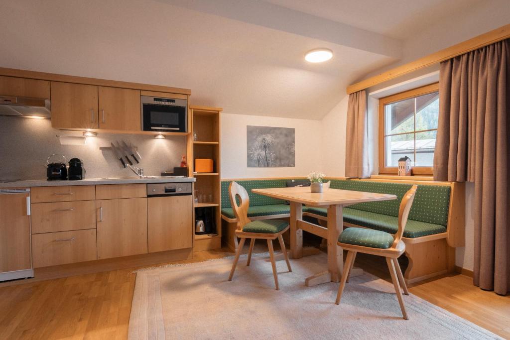 Kuchyňa alebo kuchynka v ubytovaní Apartments SARLO