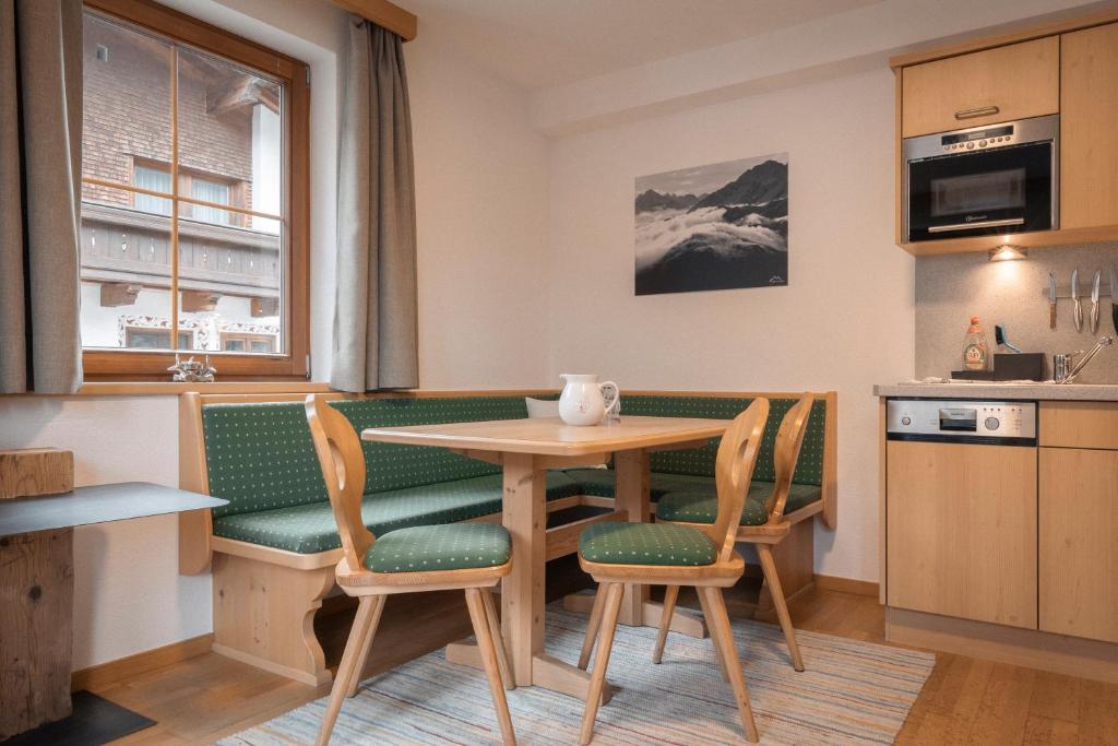 Kuchyňa alebo kuchynka v ubytovaní Apartments SARLO