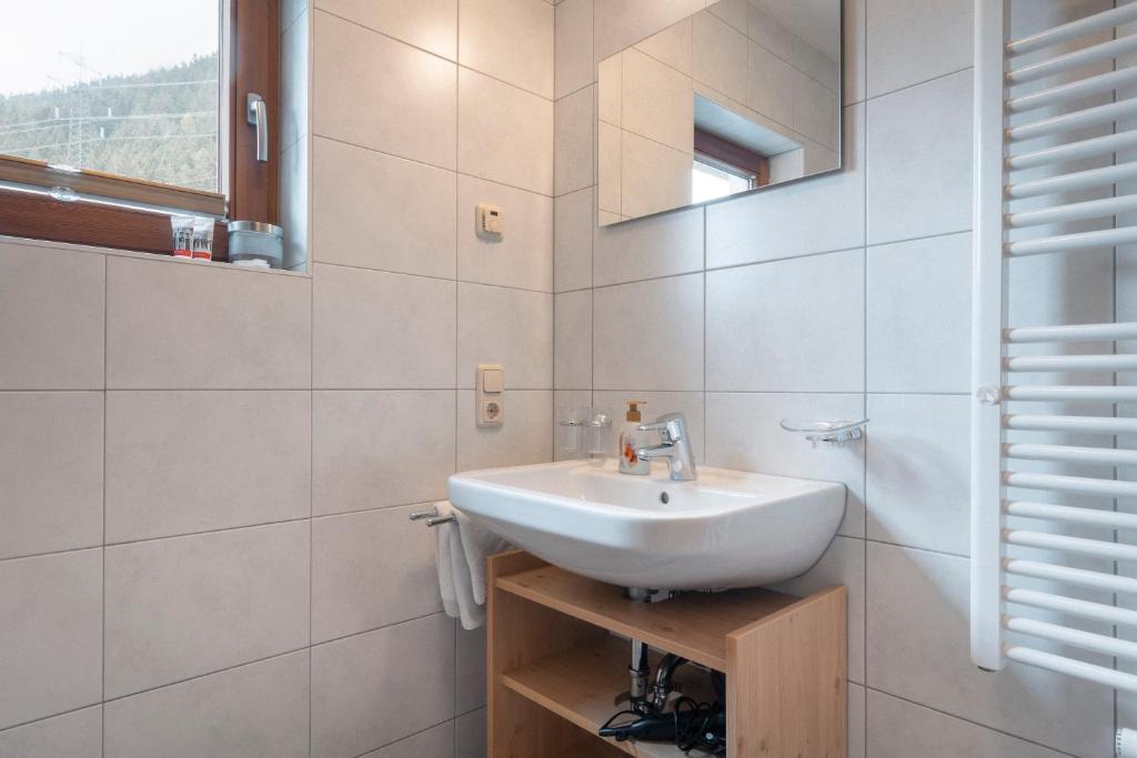 Kúpeľňa v ubytovaní Apartments SARLO