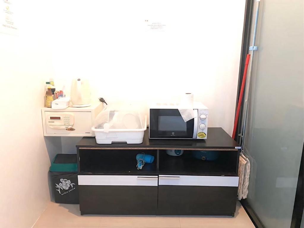 TV a/nebo společenská místnost v ubytování Share pool 1 room 2 bedroom