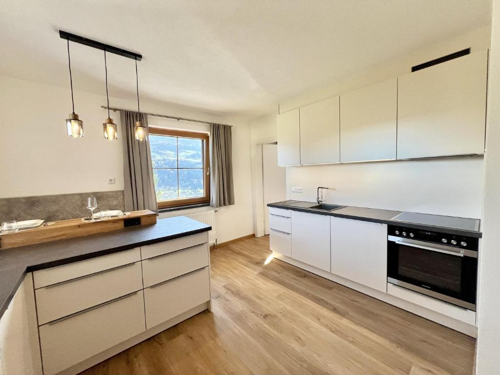 Kuchyň nebo kuchyňský kout v ubytování Appartement Pauline